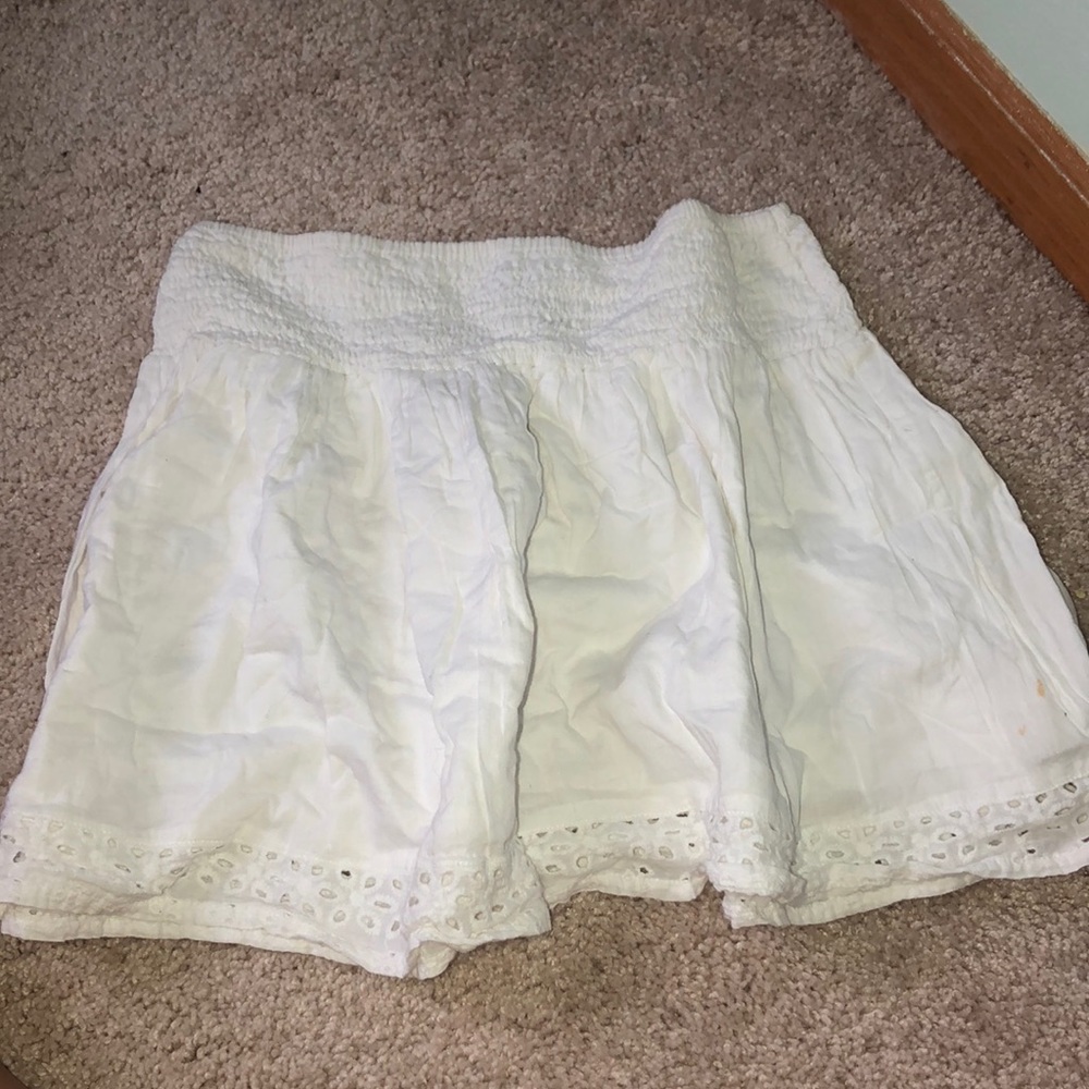 White flowy mini skirt